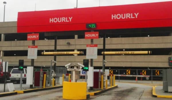 LuxShuttle private car service alternative to ATL domestic hourly parking deck — covered airport parking garage