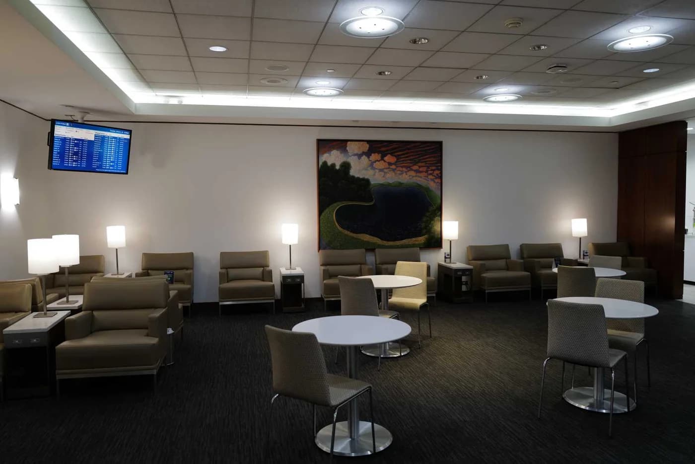 LuxShuttle private car service to United Club at Hartsfield-Jackson Atlanta — upscale seating with tarmac views