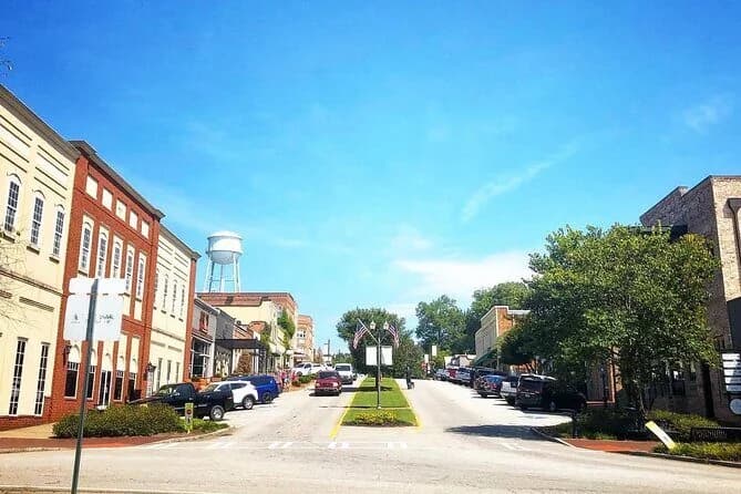LuxShuttle private car to Senoia Walking Dead filming locations — guided tour transfer from CCO airport