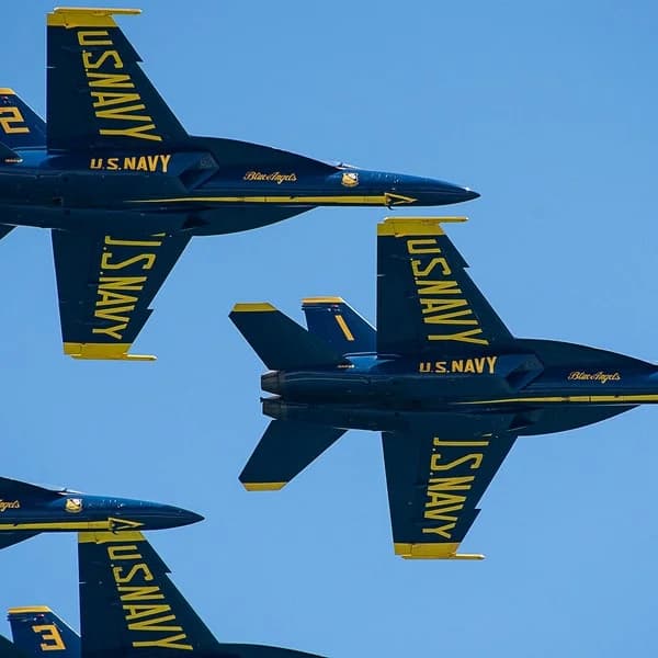 LuxShuttle private transfer to Atlanta Air Show — Blue Angels diamond formation at Falcon Field