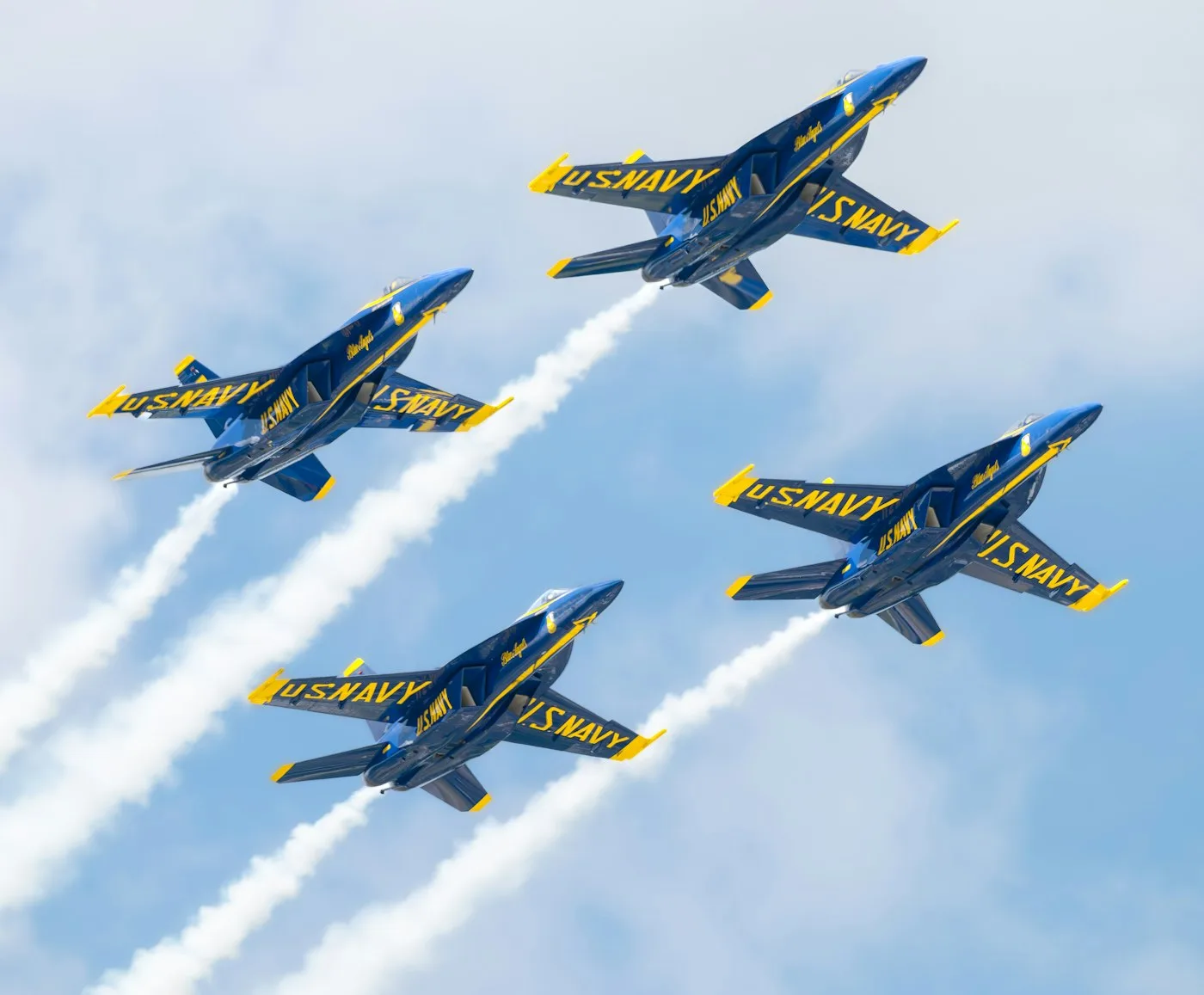 LuxShuttle private chauffeur service to Blue Angels air show — delta formation over Falcon Field