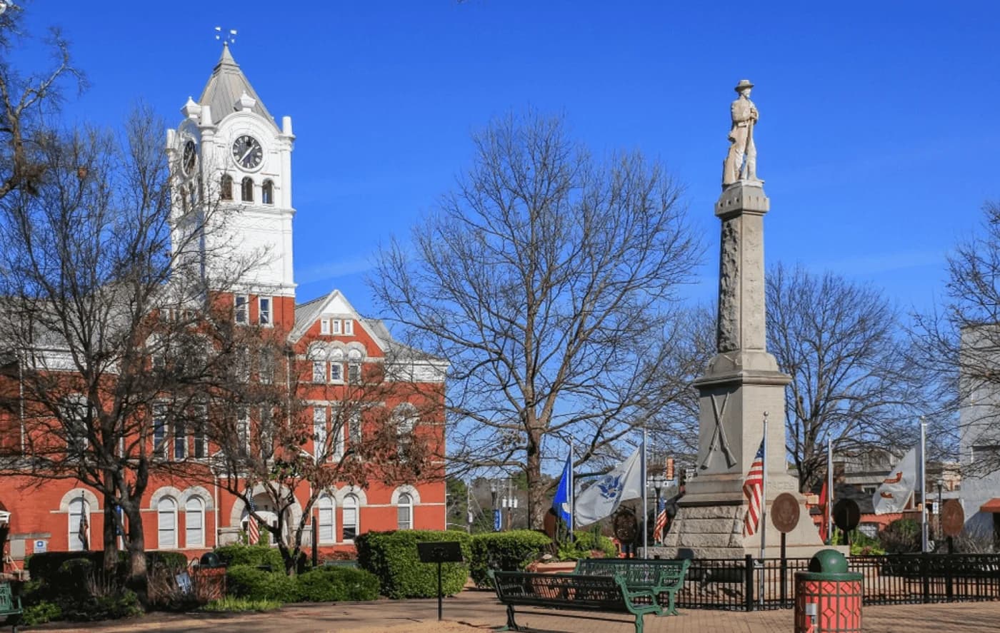 LuxShuttle private car service to McDonough town square dining — historic Georgia courthouse district restaurants