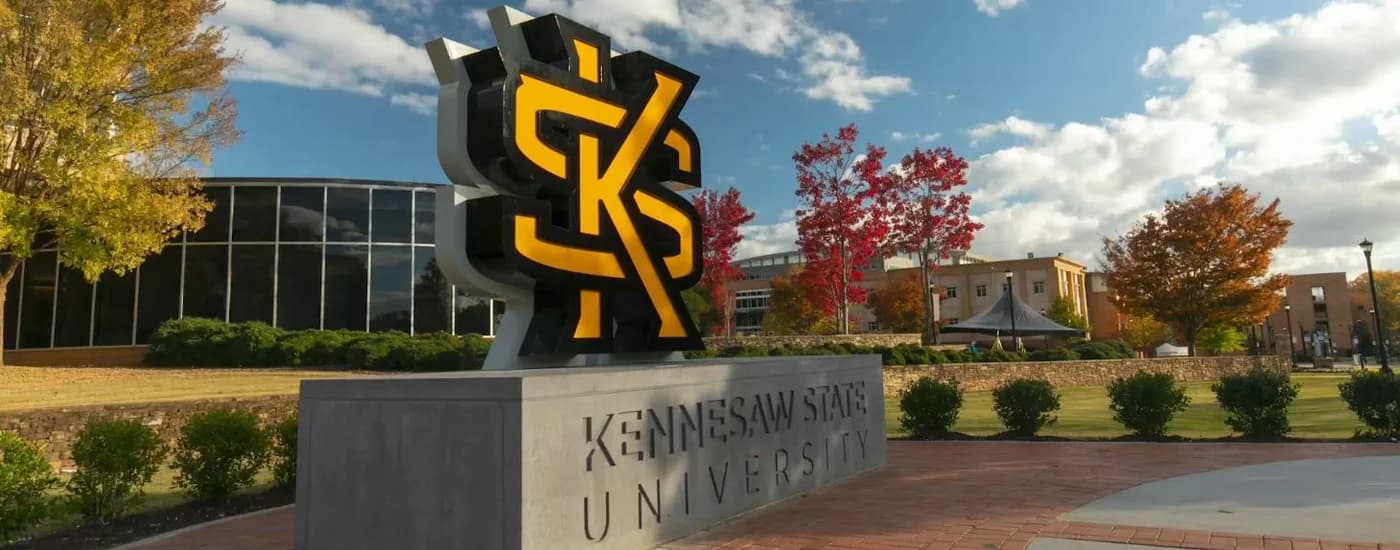 LuxShuttle executive transfer to Kennesaw State University — corporate and academic campus near McCollum Field RYY