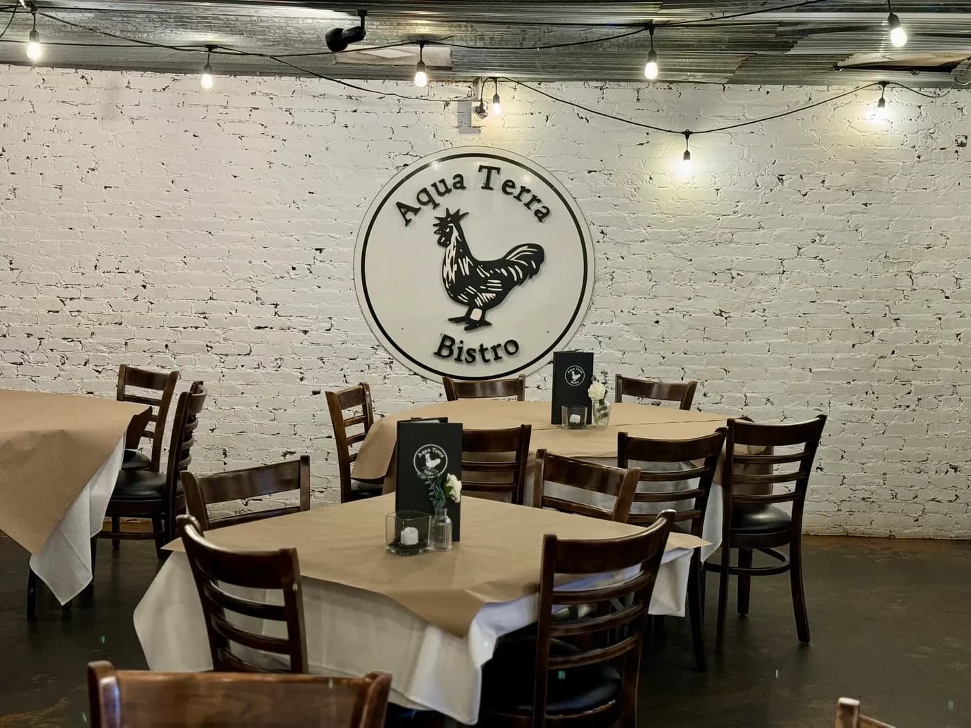 LuxShuttle private transfer to Aqua Terra Bistro — farm-to-table French-American dining in downtown Buford near LZU Airport
