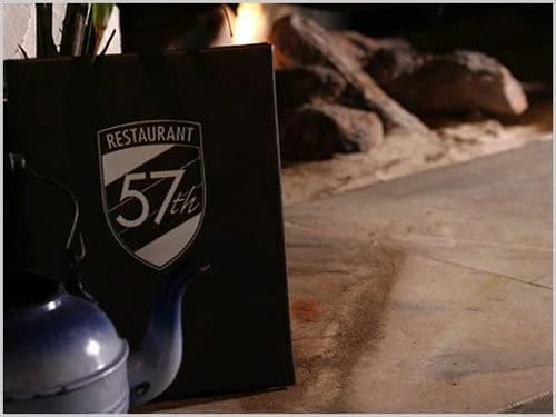 LuxShuttle chauffeur service to 57th Fighter Group Restaurant — aviation-themed fine dining on the PDK airfield