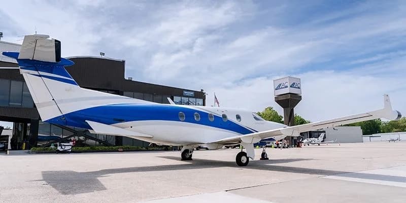 LuxShuttle luxury transfer to Atlantic Aviation FBO at DeKalb-Peachtree Airport — private aircraft on ramp at PDK