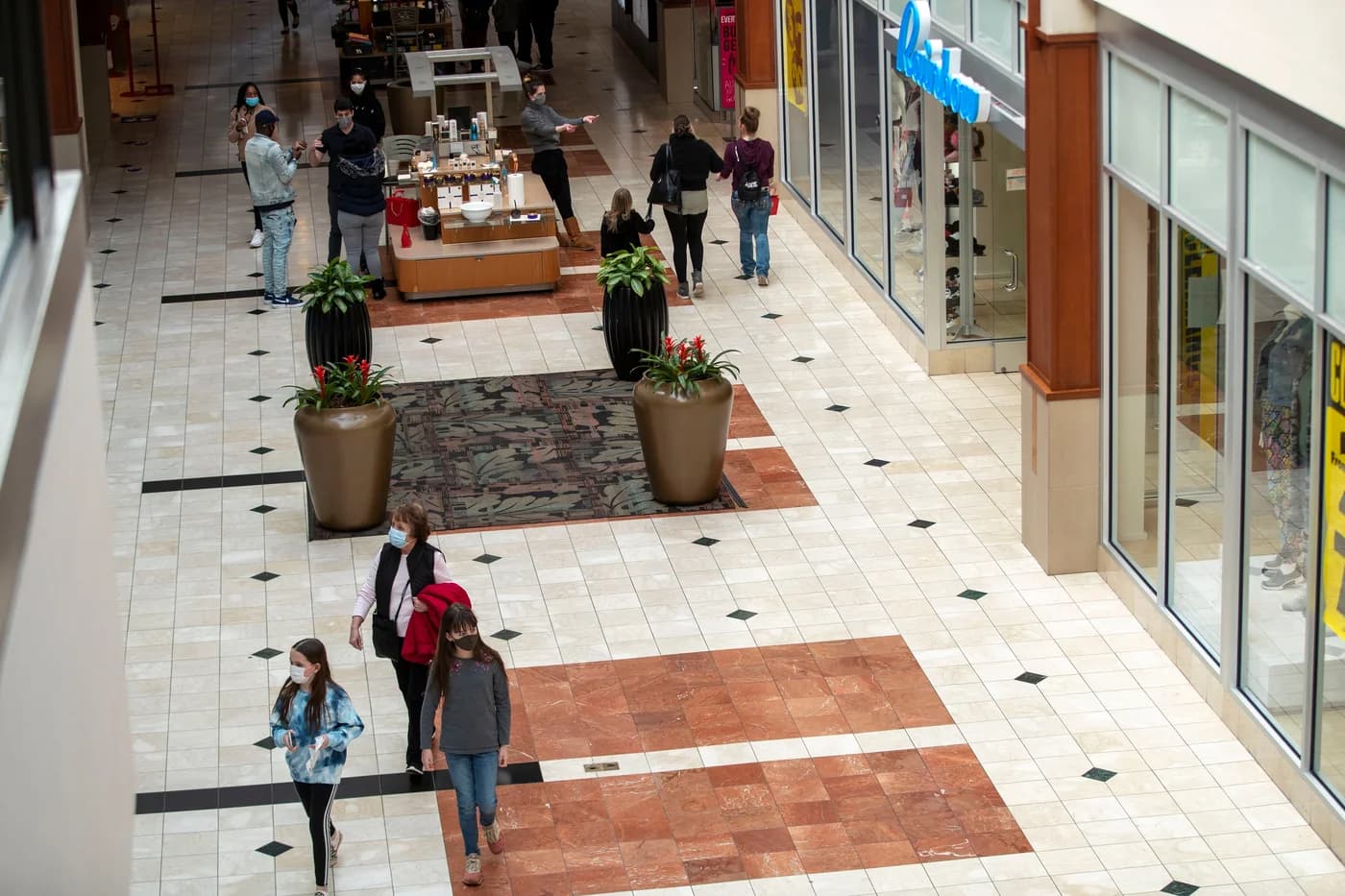 LuxShuttle private transfer to Town Center at Cobb retail district near McCollum Field