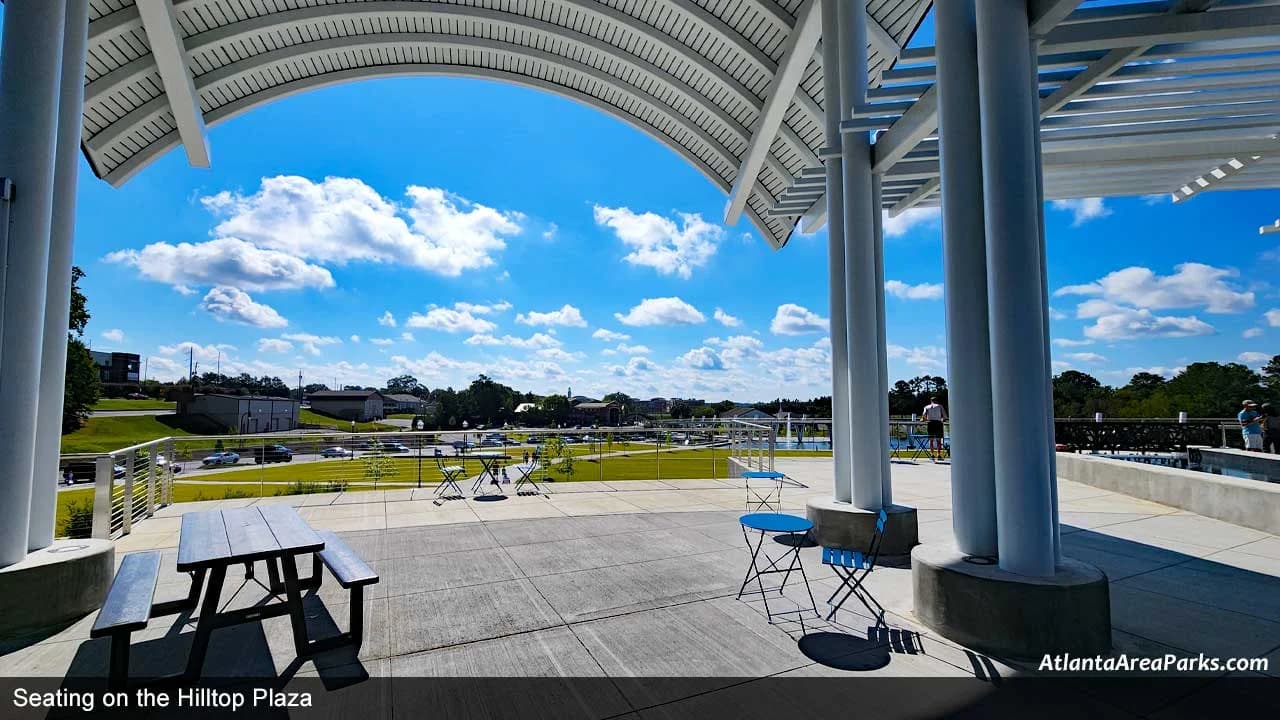 LuxShuttle chauffeur service to Suwanee Town Center — outdoor dining and community gathering space