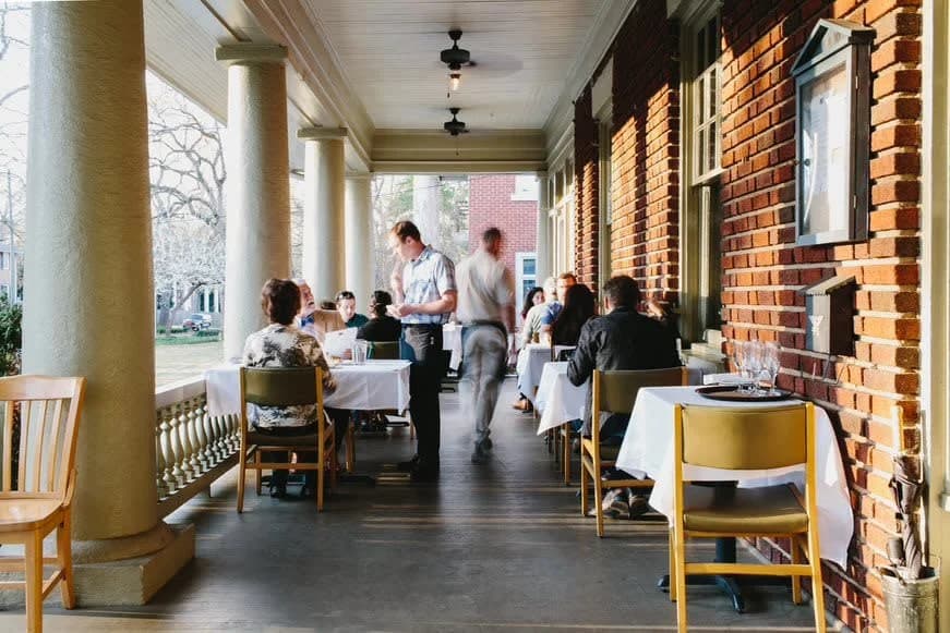LuxShuttle private chauffeur to Five and Ten — Chef Hugh Acheson landmark Athens restaurant near WDR