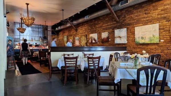 LuxShuttle private chauffeur to Last Resort Grill — Southern eclectic dining in Athens warehouse district near WDR