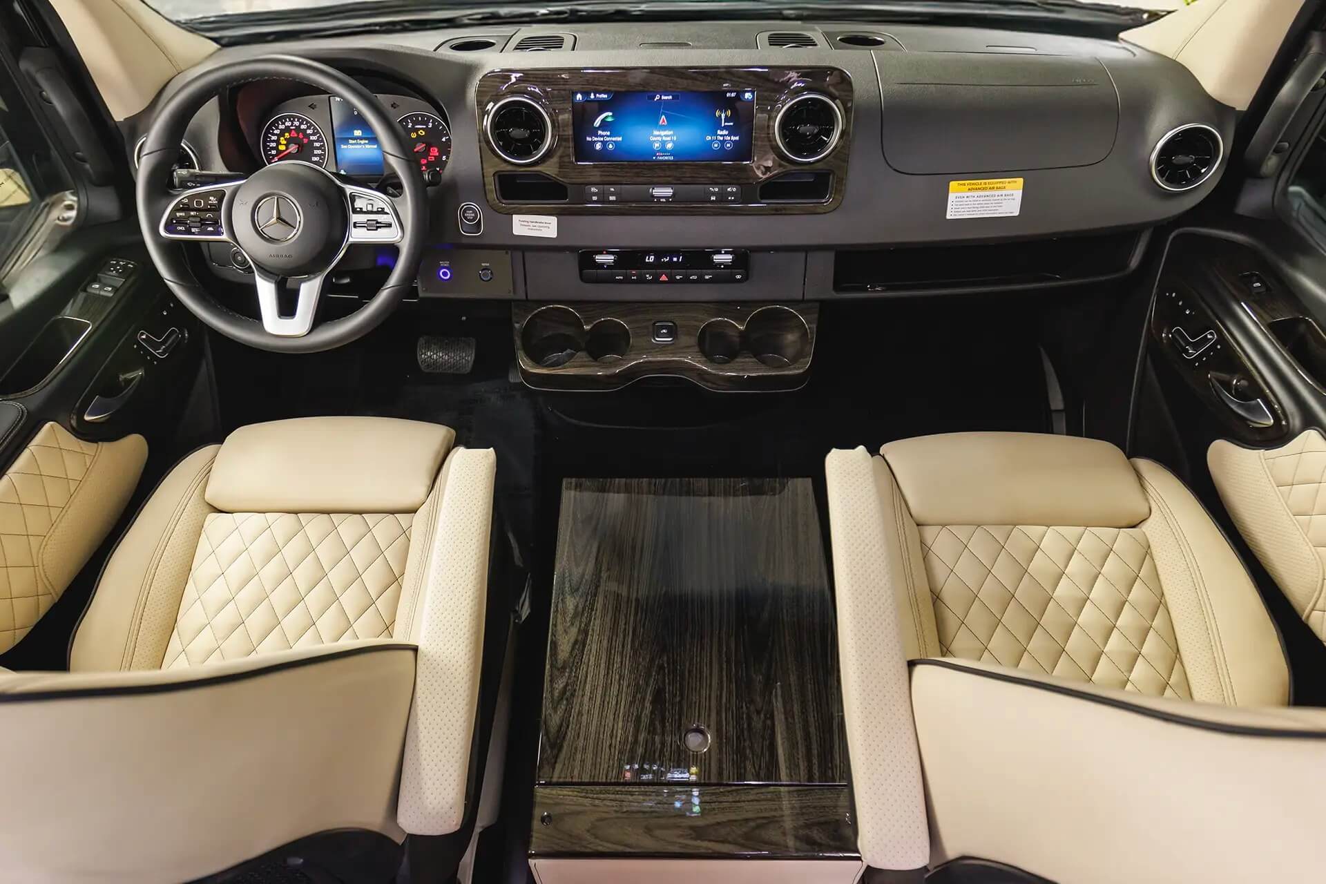 Custom Mercedes Sprinter driver cockpit with Apple CarPlay and RAM phone mount