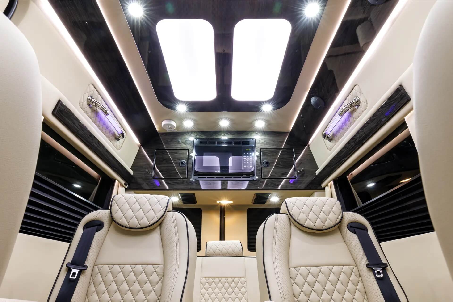 Mercedes Sprinter luxury interior with refrigerator and ambient LED lighting