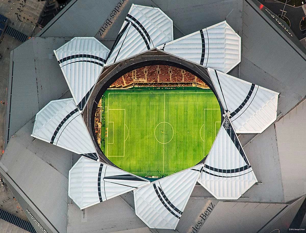 Mercedes-Benz Stadium aerial view with retractable roof open