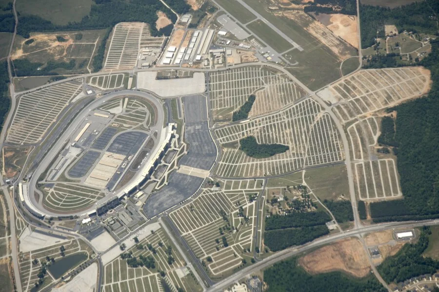 Aerial view of EchoPark Speedway adjacent to HMP Atlanta Speedway Airport
