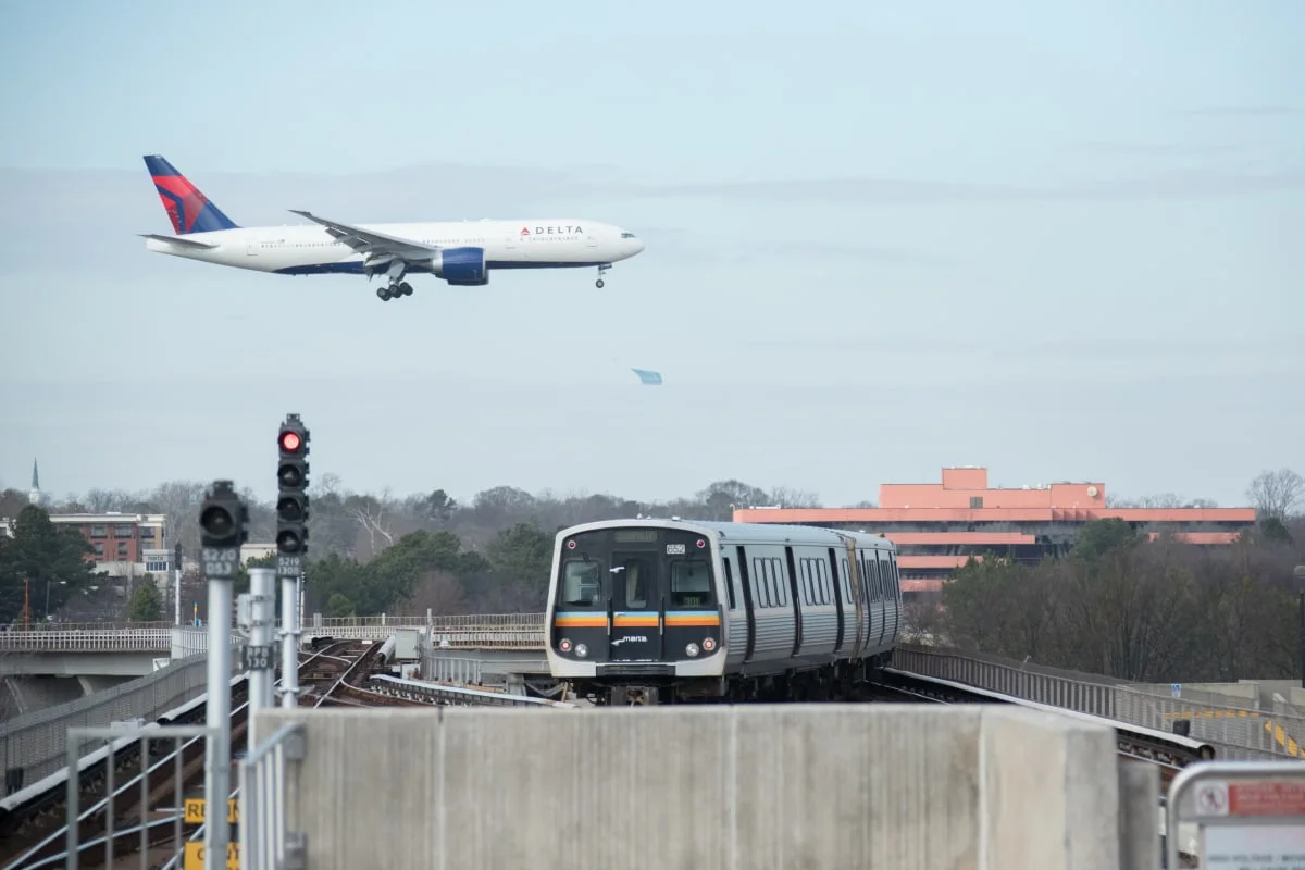 Delta aircraft and MARTA train at Hartsfield-Jackson Atlanta International Airport