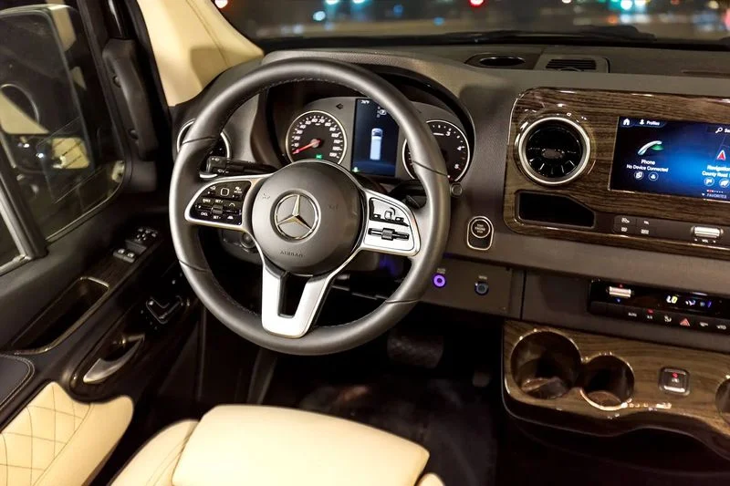 LuxShuttle Mercedes Sprinter cockpit with cream leather