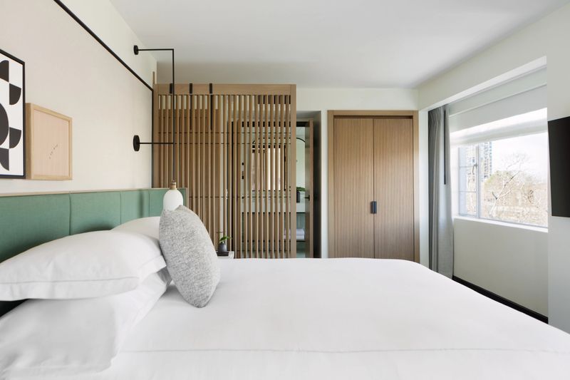 Guest room at Kimpton Sylvan Hotel — mid-century modern design