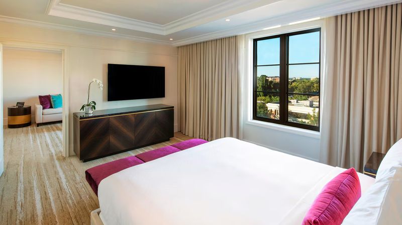 St. Regis Atlanta guest suite with floor-to-ceiling windows